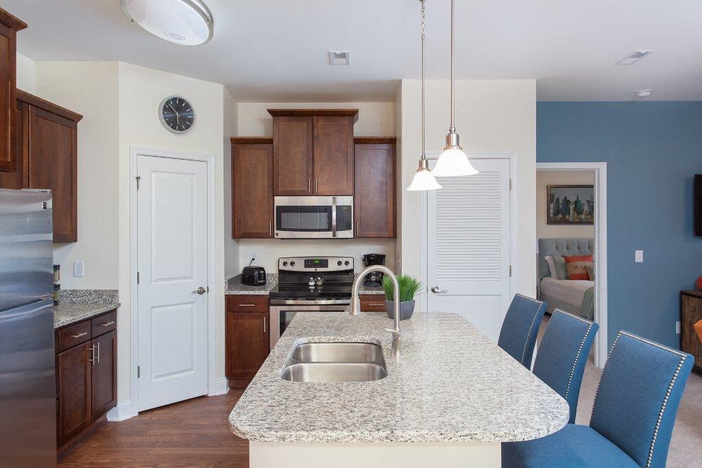 a kitchen with a counter top and a sink