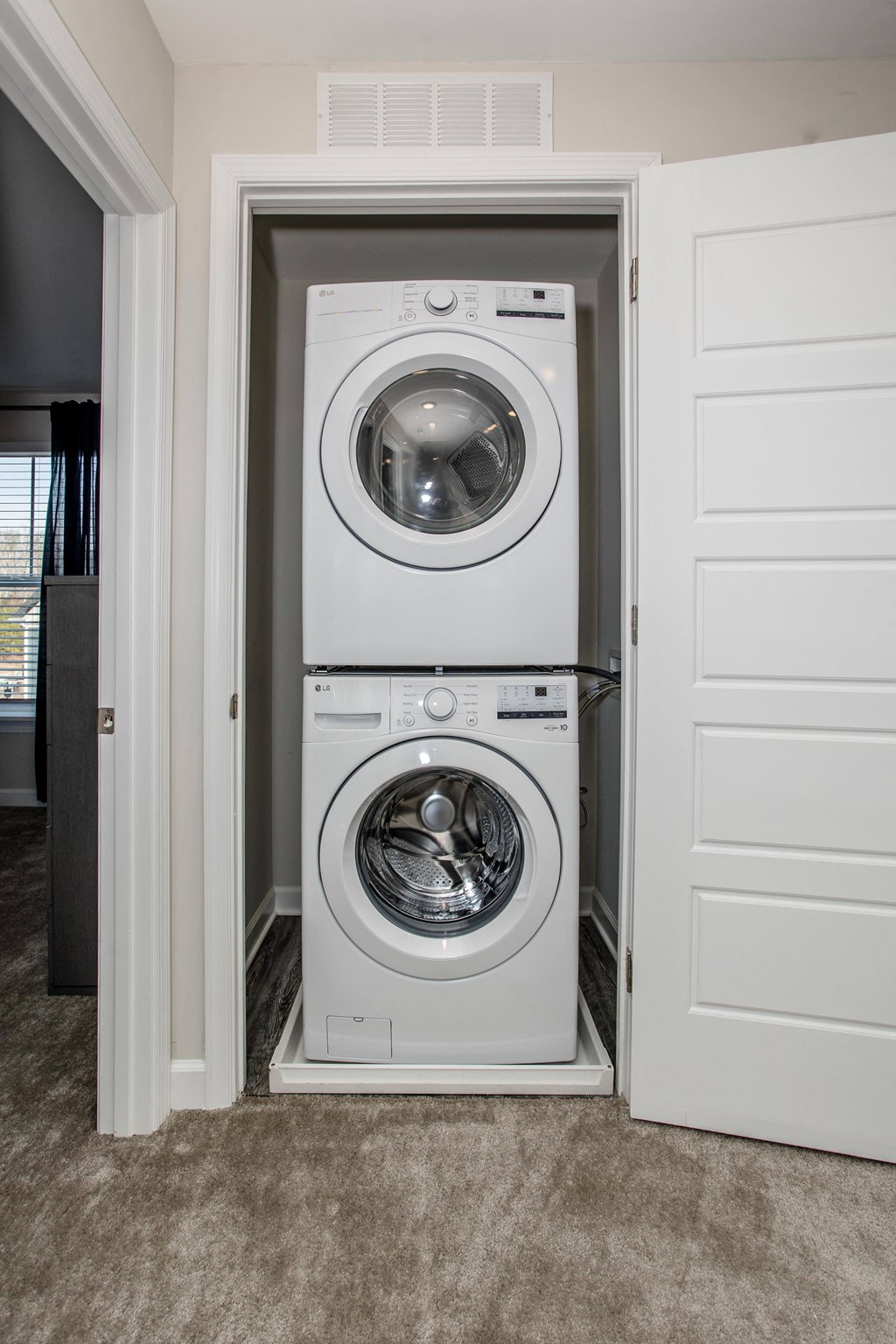 a white washer and dryer in a laundry room