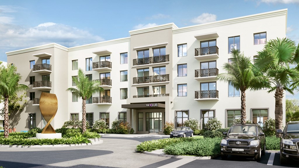 a rendering of an apartment building with cars parked in front of it