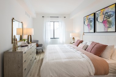 Bedroom with cozy bed at Altis Ludlam Trail, Miami, FL - Photo Gallery 4