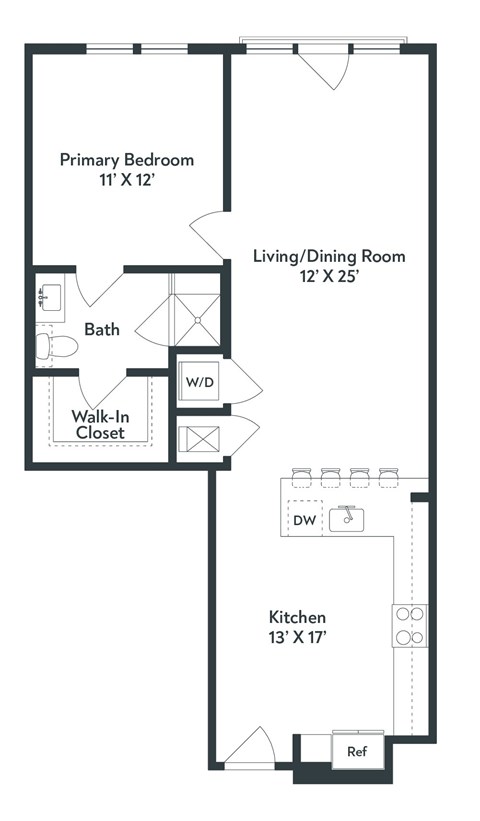 A floor plan of a small apartment with a primary bedroom, living/dining room, kitchen, bath, and walk-in closet.