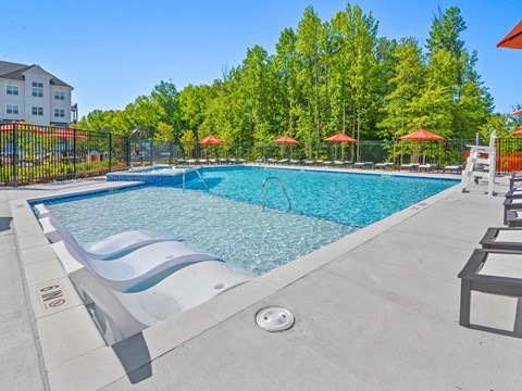 the reserve at city center spacious pool with chaise lounge chairs