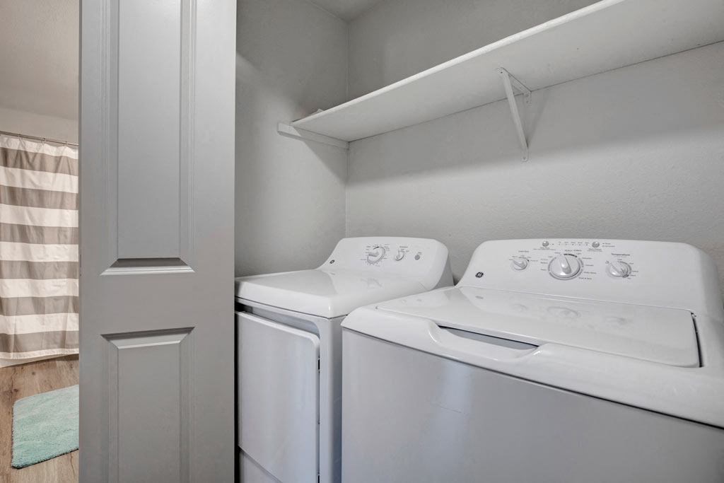a washer and dryer in a laundry room