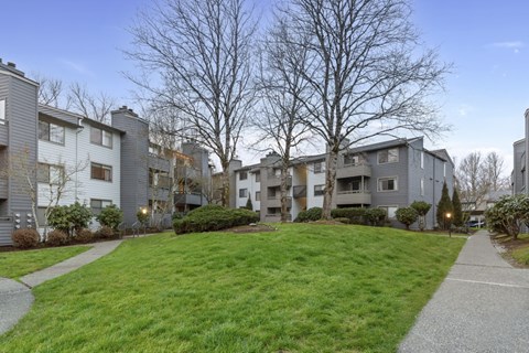 A residential area with houses and a clear sky.