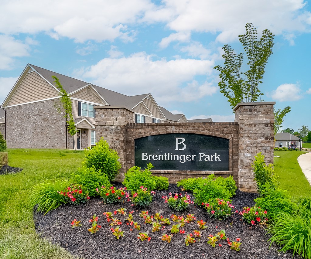the preserve at berninger park entrance sign with flowers