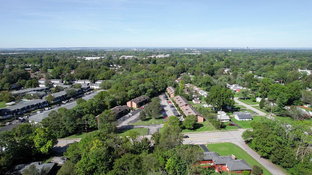 an aerial view of a neighborhood of houses and trees