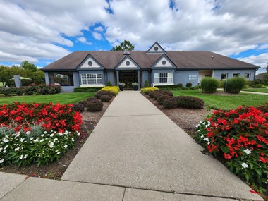 a house with a walkway in front of it