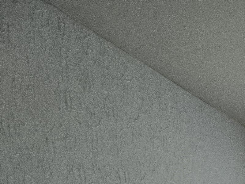 an empty room with a window in the wall