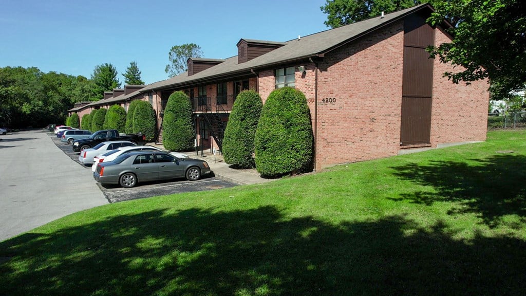 a building with cars parked outside of it