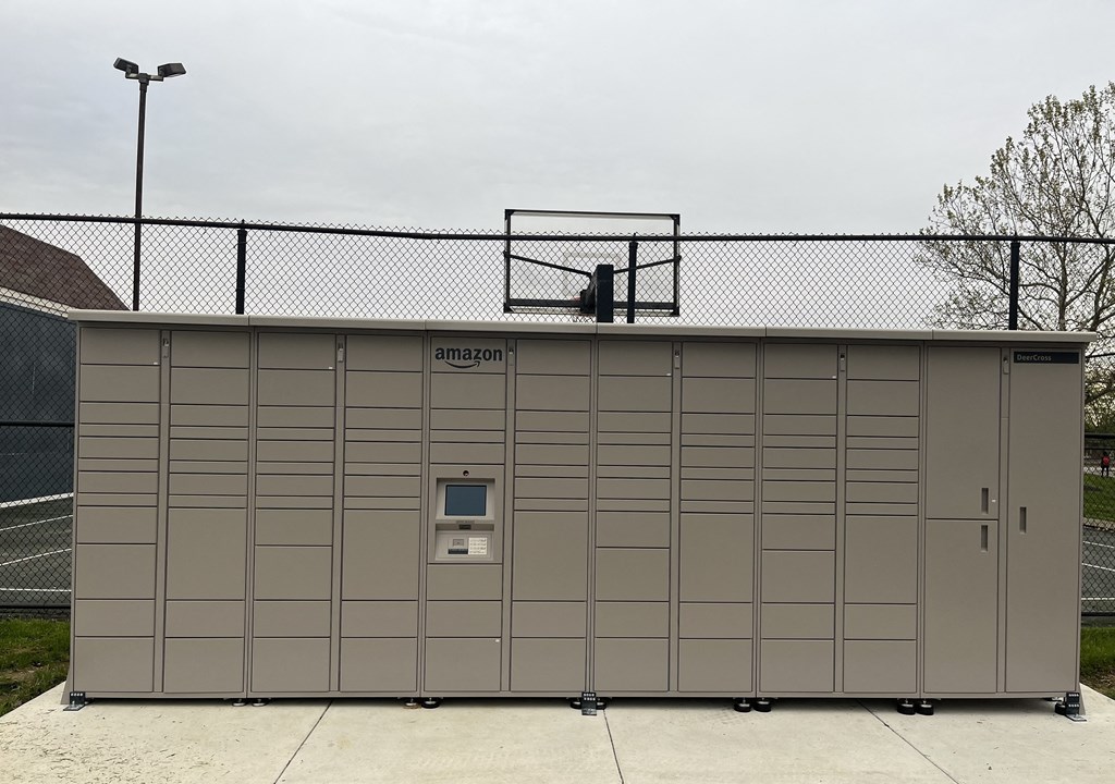 a small building with a basketball hoop on top