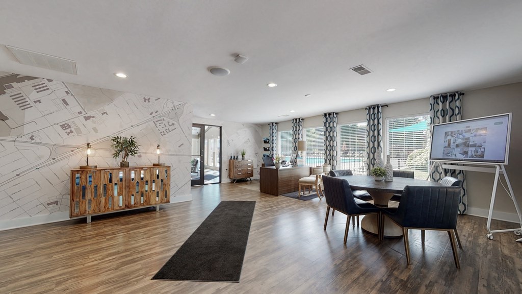 a dining room and living room with a table and chairs