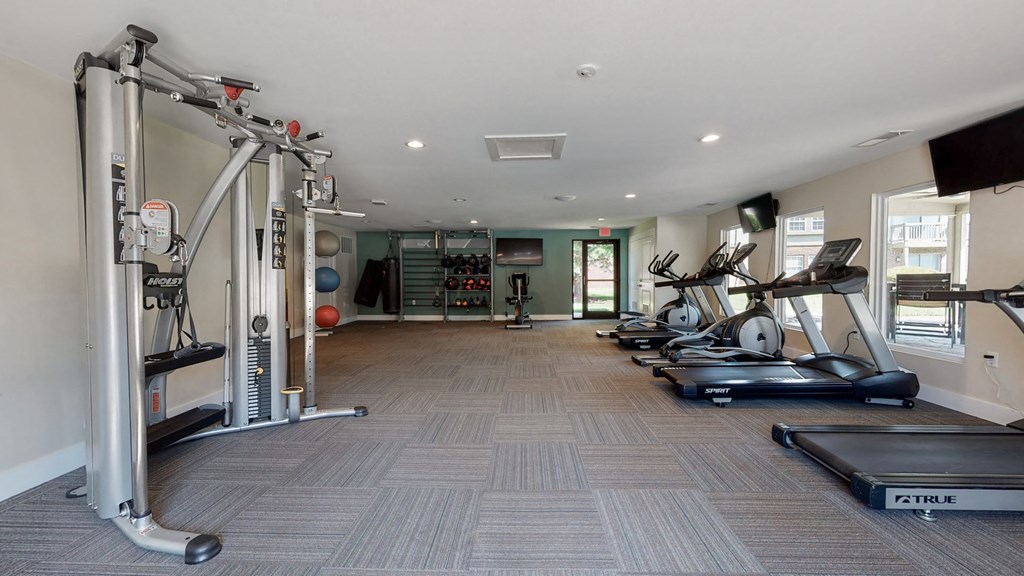 the gym at the flats at big tex apartments