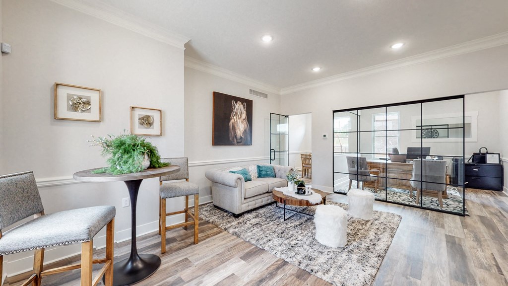 a living room with a couch and a table