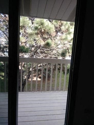 a view of a balcony from a window