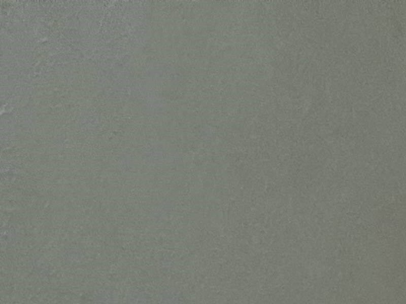 A wall with a fan on it.