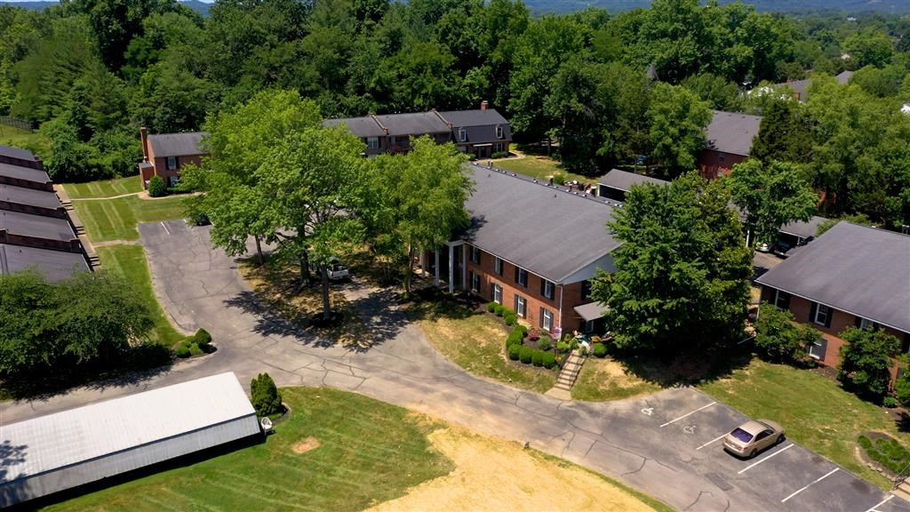 an aerial view of a neighborhood with houses and trees