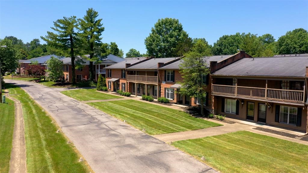 a row of houses on the side of a street