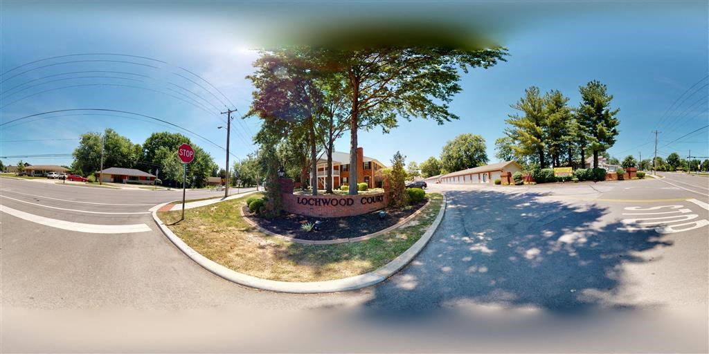 an image of an intersection with a stop sign