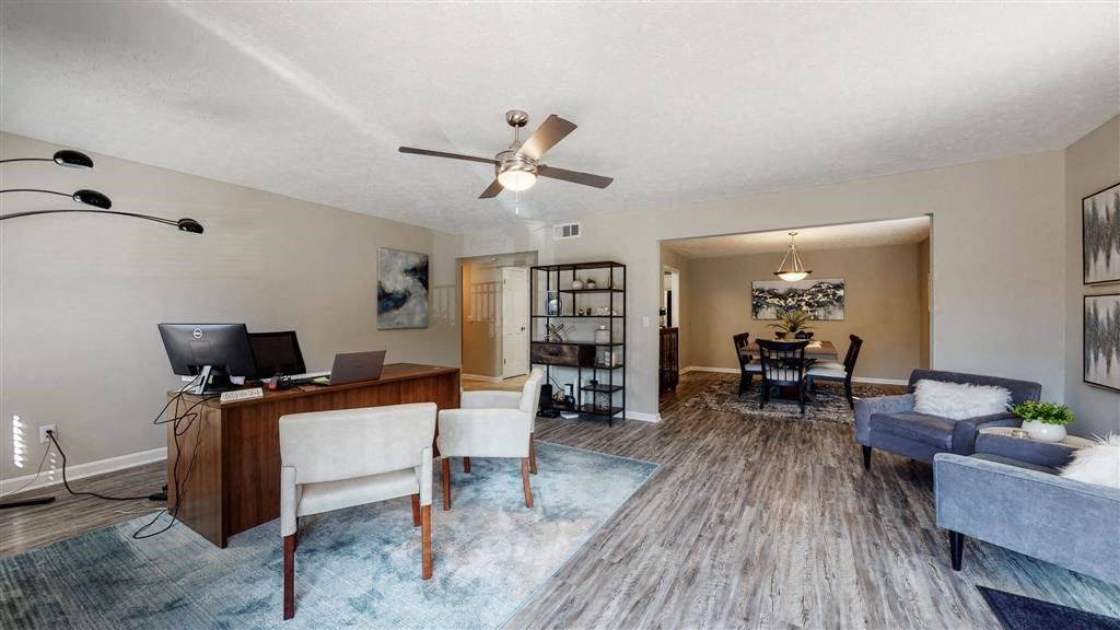 a living room with a couch and a table