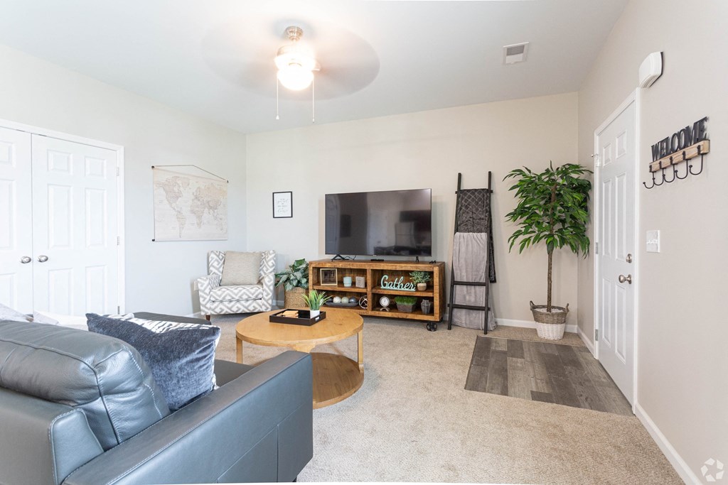 an illustration of a living room with chairs and a table