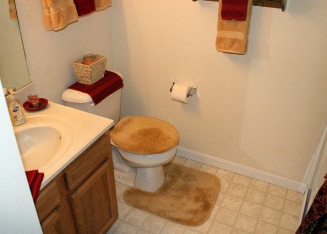 a bathroom with a toilet and a sink
