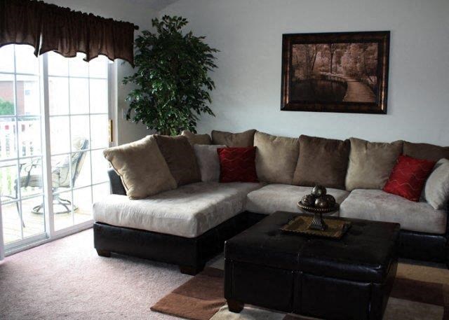 a living room with a couch and a table