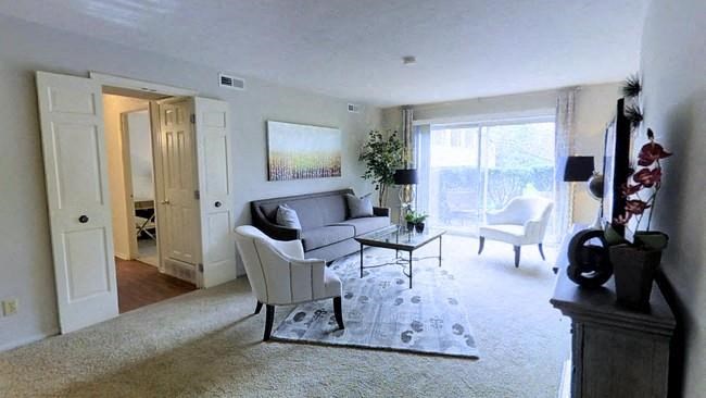 a living room with a couch and a table