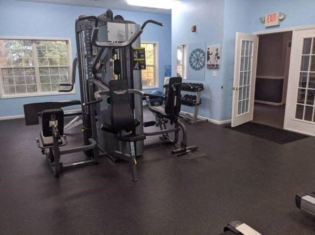 a gym with some exercise equipment in it