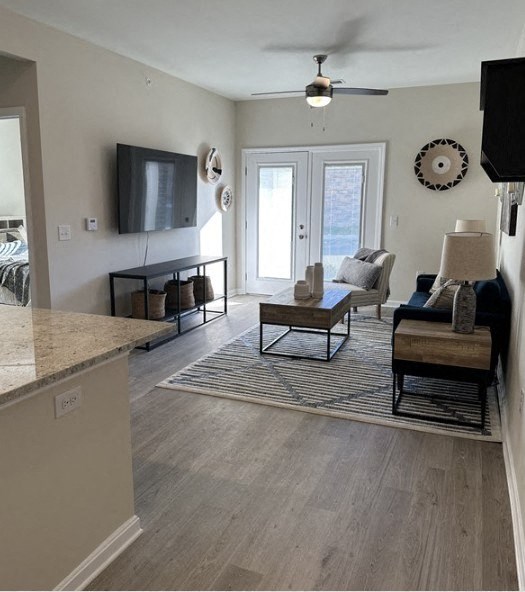 a living room with a couch and a tv