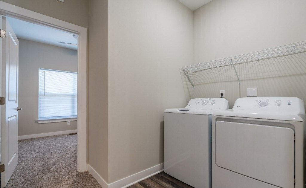 A laundry room with a washer and dryer.