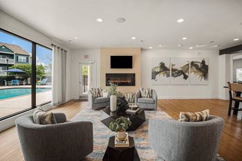 Clubroom With TV at Aventura at Richmond, St. Peters, Missouri