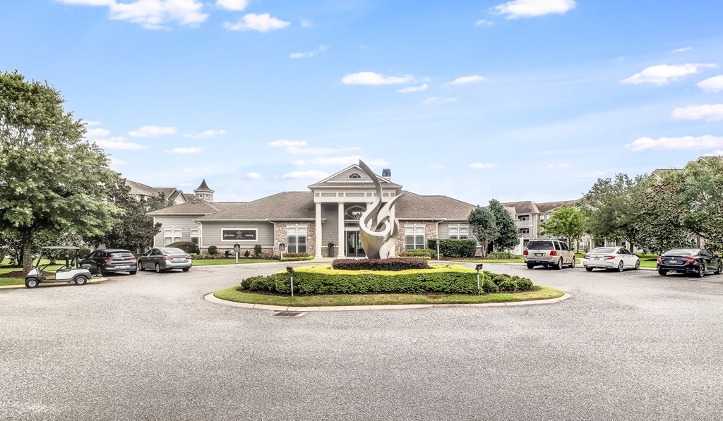 A large building with a circular driveway in front of it, Plantation Crossing, Lafayette, LA, 70508