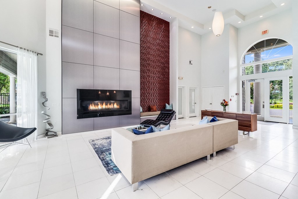a living room filled with furniture and a fireplace at Plantation Crossing, Lafayette, LA