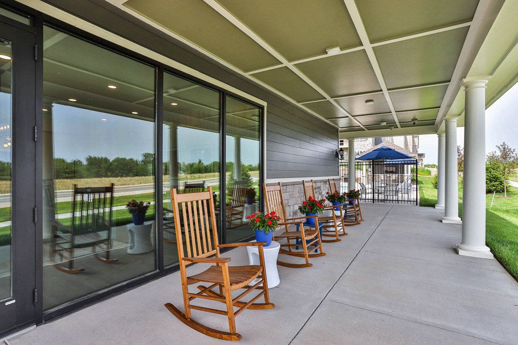 a long porch with rocking chairs and a gazebo at Aventura at Hawk Ridge, Lake St Louis, 63367