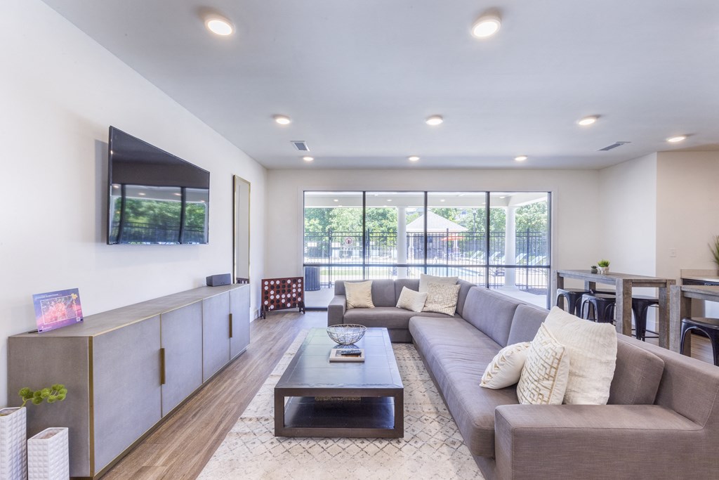 a living room with a couch and a coffee table at Aventura at Towne Centre, Missouri, 63011
