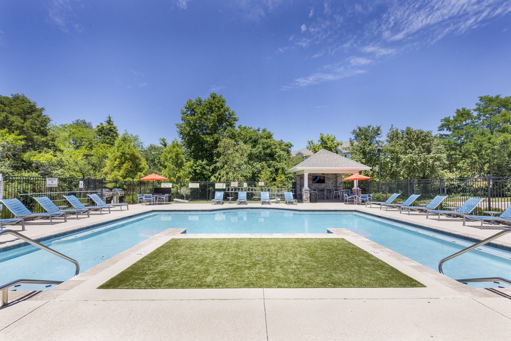 the swimming pool at the preserve at polk apartments ga at Aventura at Towne Centre, Ellisville, MO