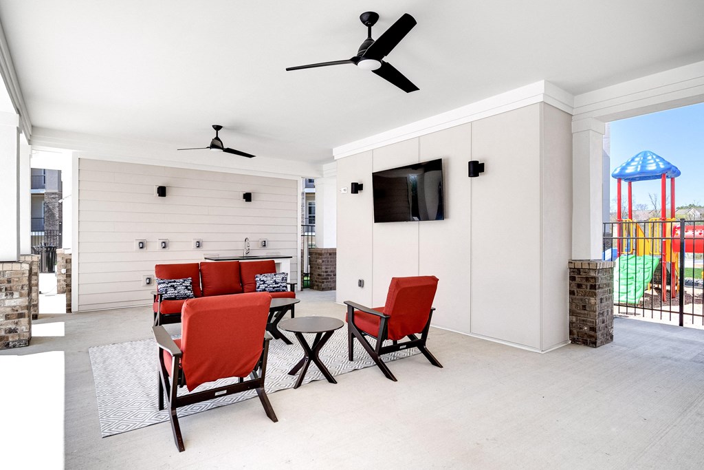 Outdoor Lounge Area With TV at The Edison at Riverwood, Hermitage, TN