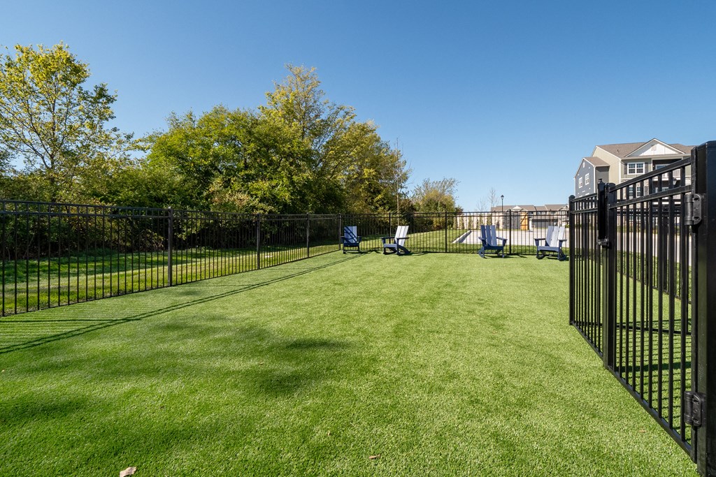 dog park with fence and chairs  at Aventura at Hawk Ridge, Lake St Louis, MO, 63367