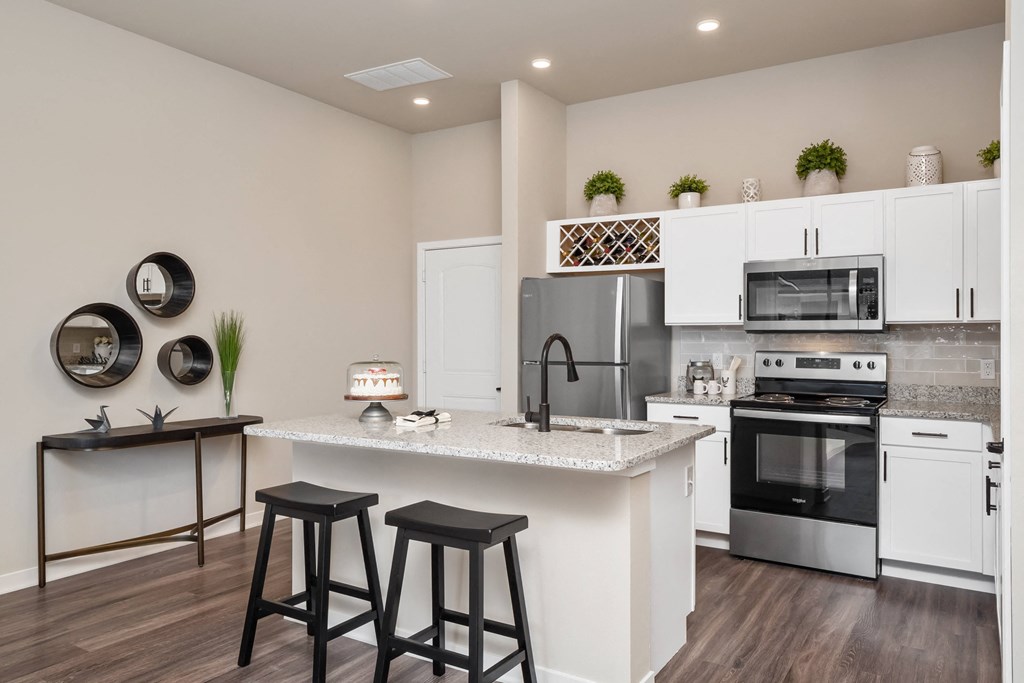 White Cabinetry and Stainless Appliance Package
