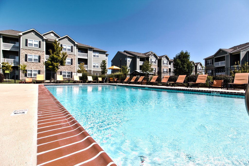 large swimming pool with lounge chairs  at Aventura at Richmond, St. Peters, 63376