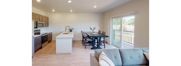 Kitchen and dining area, with balcony