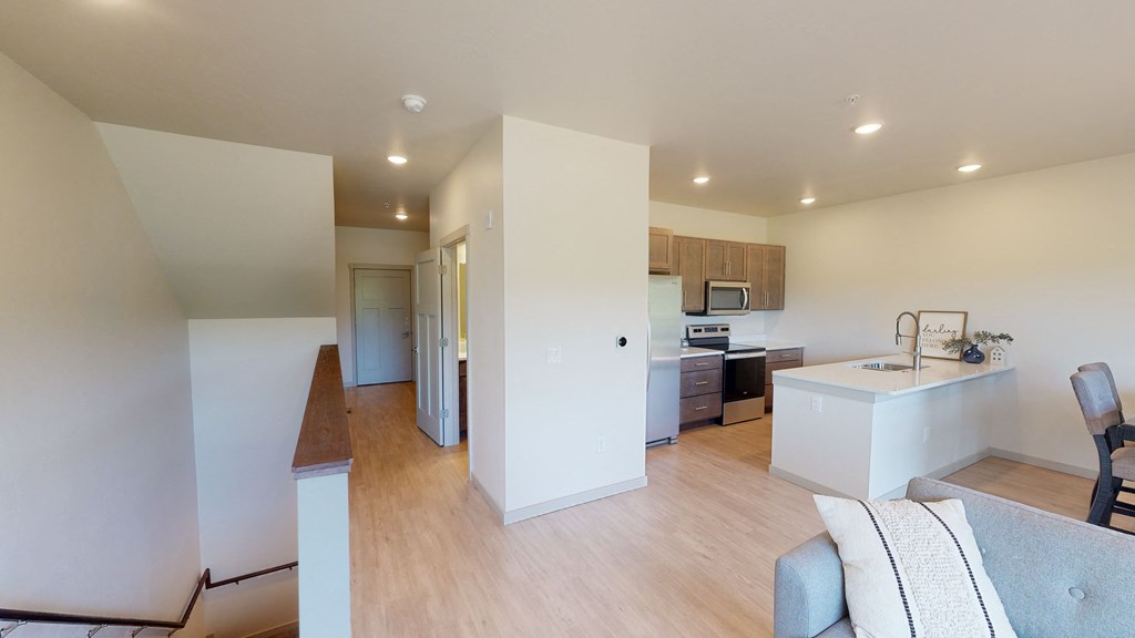 View of Space, Hallway, 1/2 Bath, Kitchen and Stairs