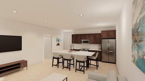 A modern kitchen with a dining table and chairs.