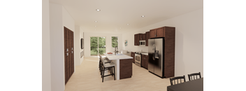 A modern kitchen with brown cabinets and a black countertop.