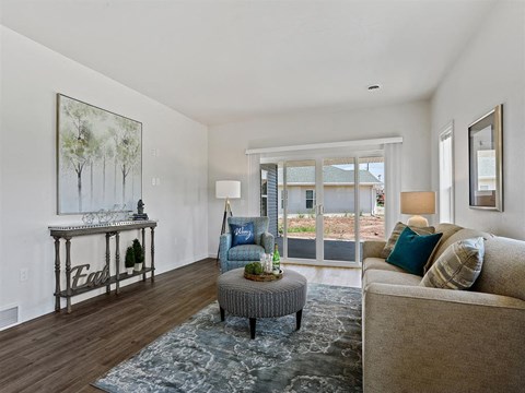 a living room with a couch and a table