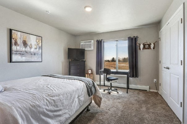 Bedroom with Queen Bed and Large Window