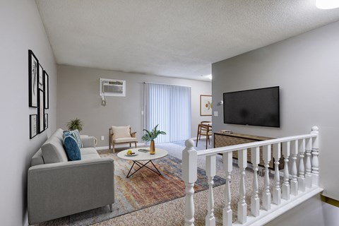 our apartments at the legacy have a living room and a tv