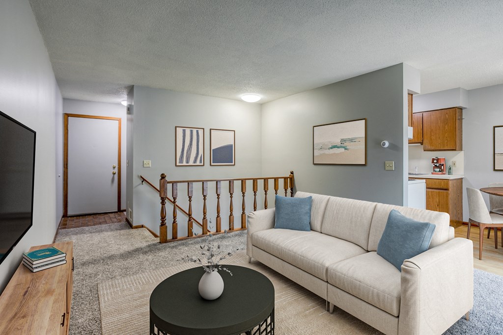 a living room with a couch and a coffee table
