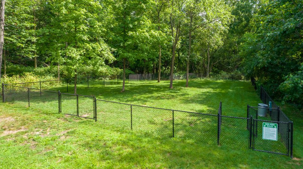 Fenced in dog park on site