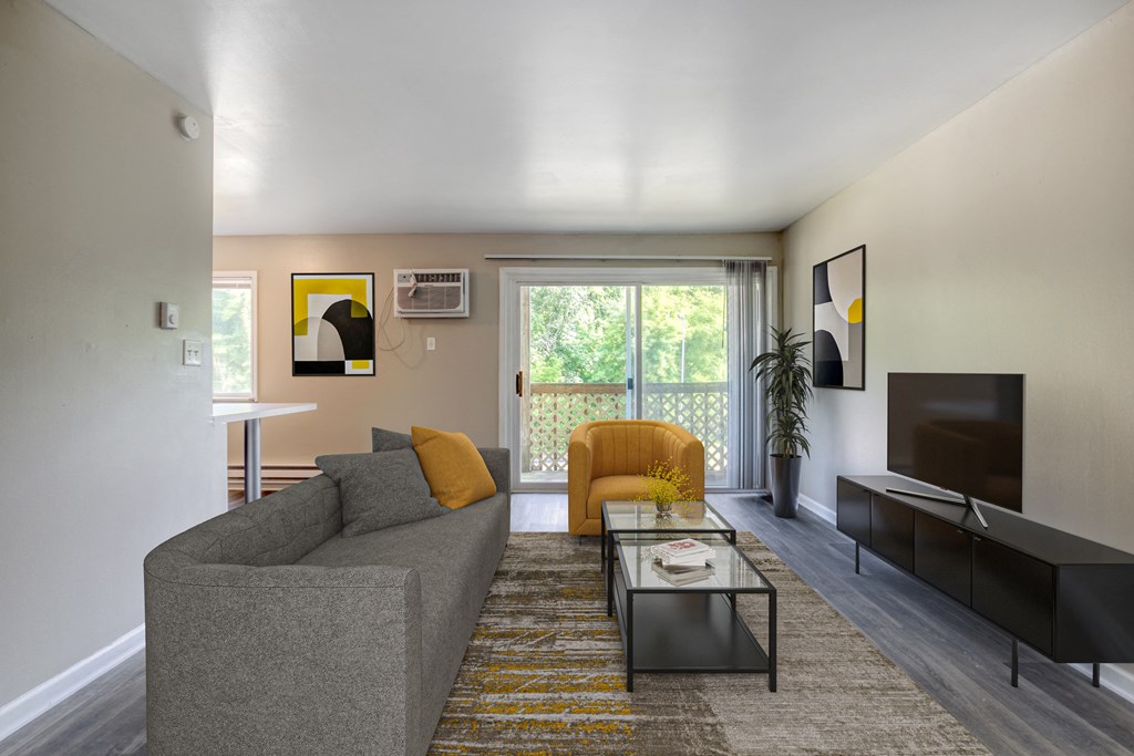 a living room with a couch and a coffee table